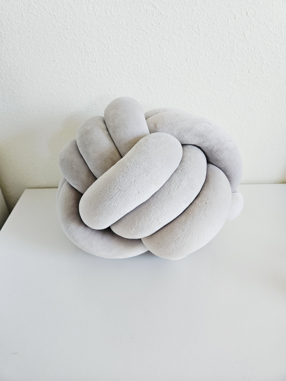 Plush Knot Throw Pillow in Light Gray